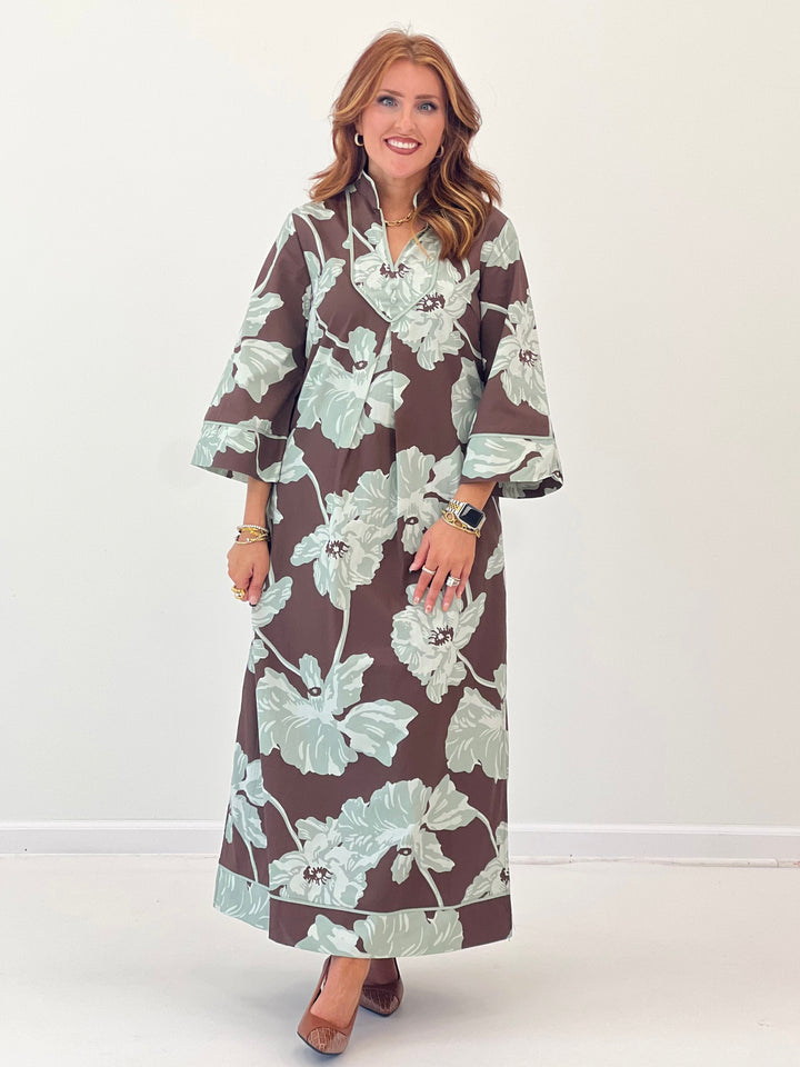 Chocolate-brown V-neck midi dress with mint floral print, long sleeves, straight midi length