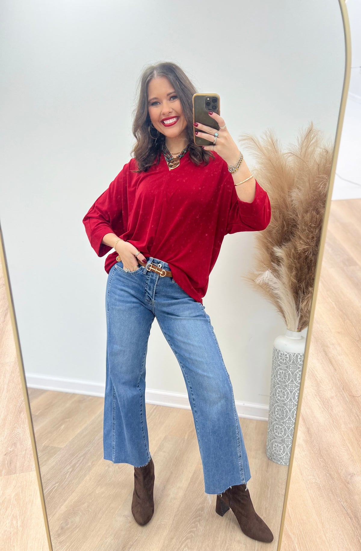 V-neck quarter-sleeve top in red with relaxed fit and V-shaped neckline