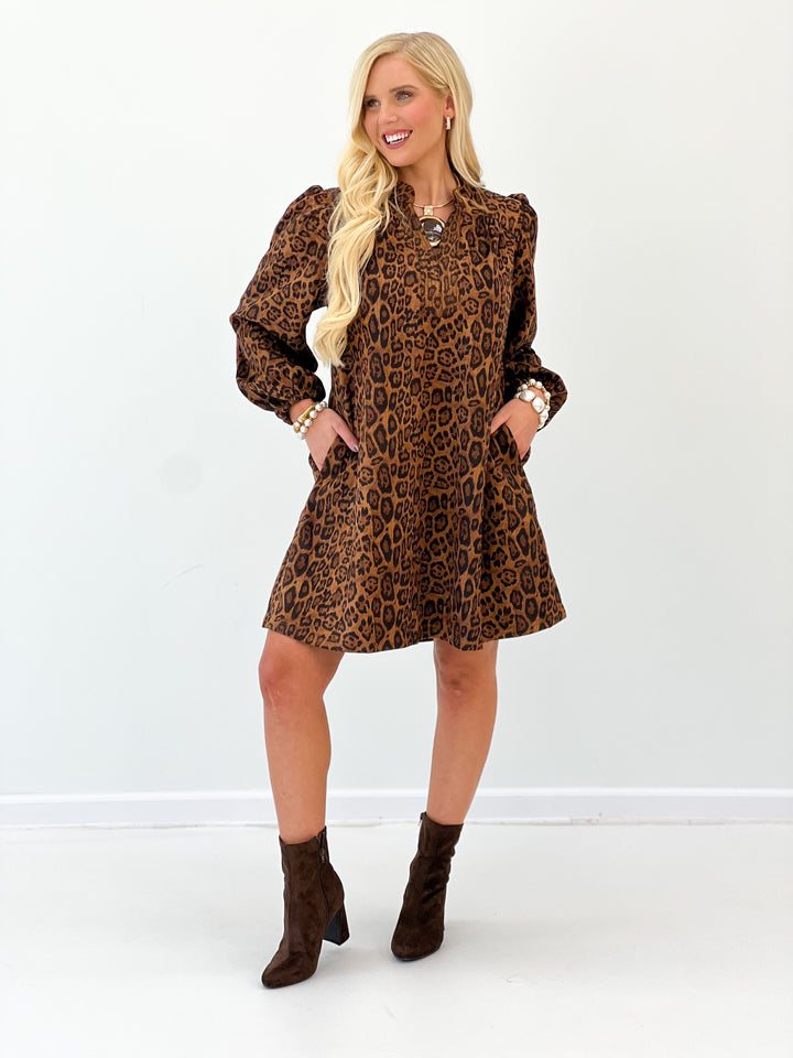 Brown leopard-print mini dress with long balloon sleeves and flared skirt