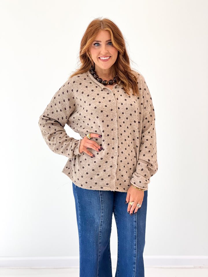 Light mocha polka-dot button cardigan with long sleeves and cuffed raw edges