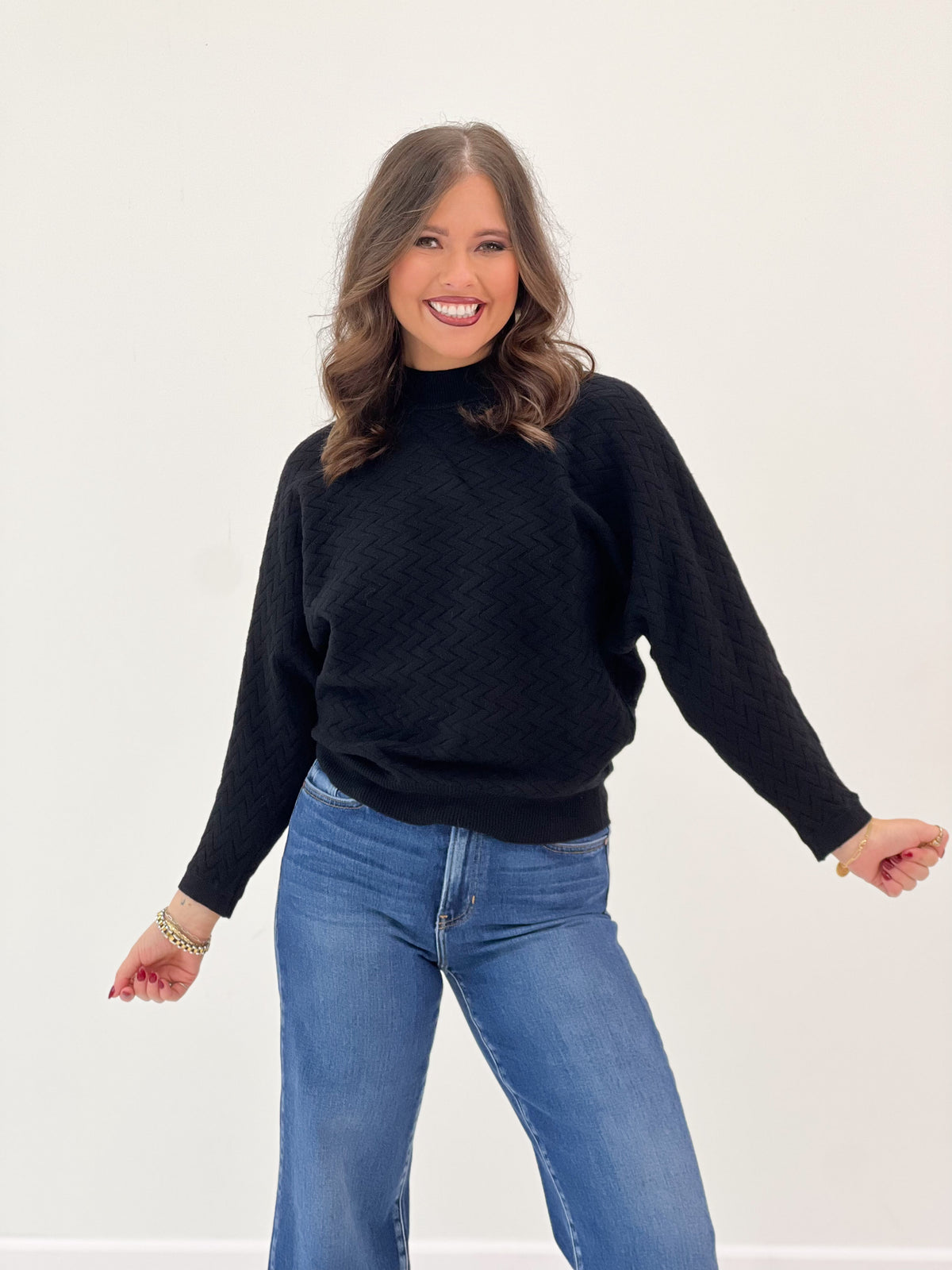 Black soft mock neck dolman sweater, long sleeves and ribbed cuffs