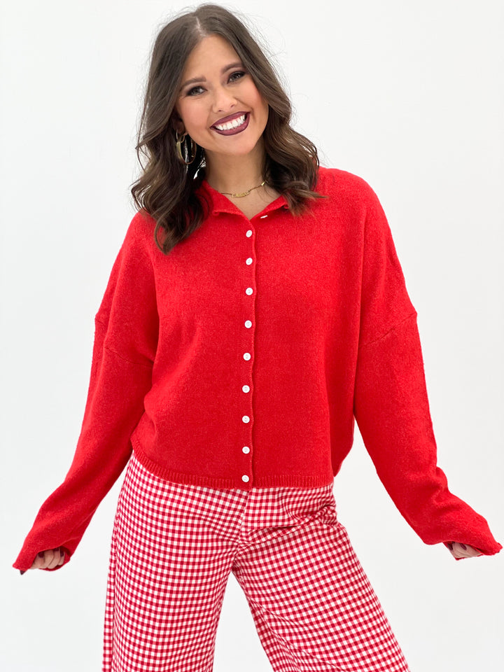 Red button-front long-sleeve cardigan with point collar and front buttons