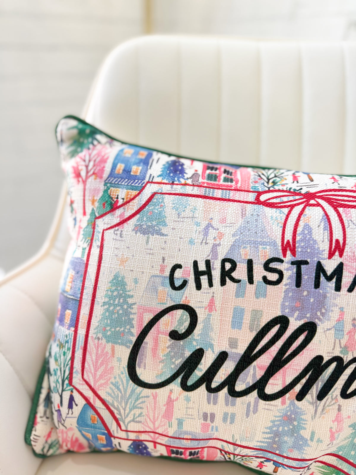 Christmas-themed throw pillow cover with 'Cullman' script and festive border design