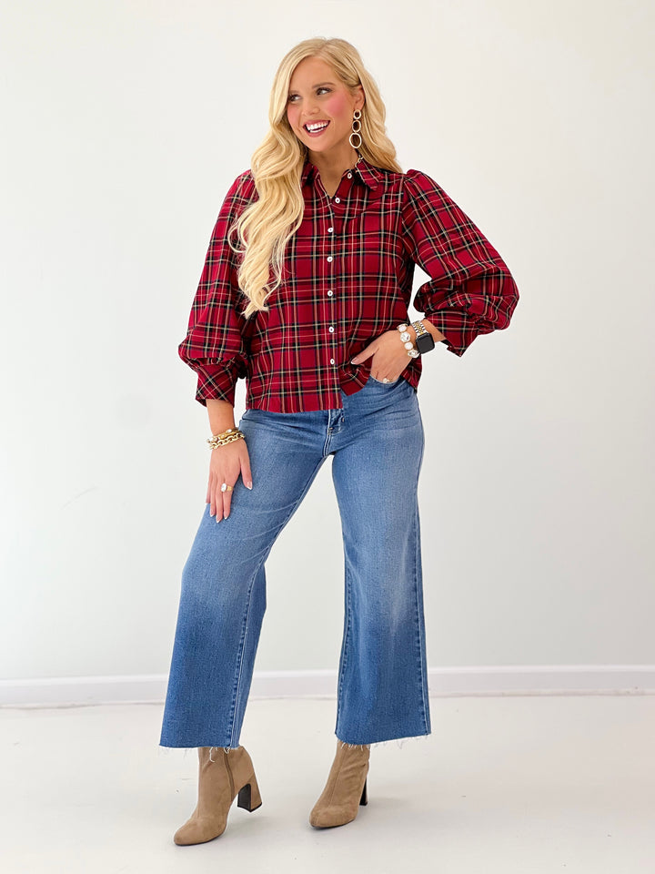 Red plaid stretch knit button-up top with stand collar and voluminous puff sleeves