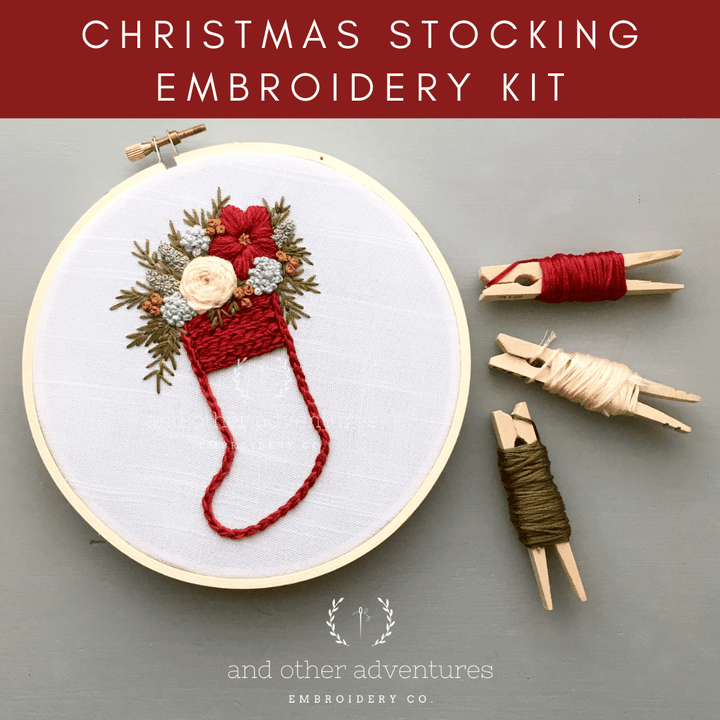 Red Christmas stocking embroidery kit with stitched stocking in hoop and threads