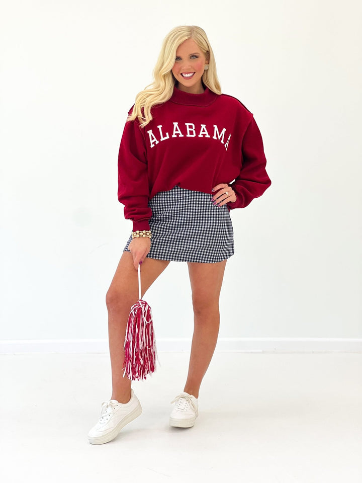 Crimson mock neck sweatshirt with an Alabama graphic