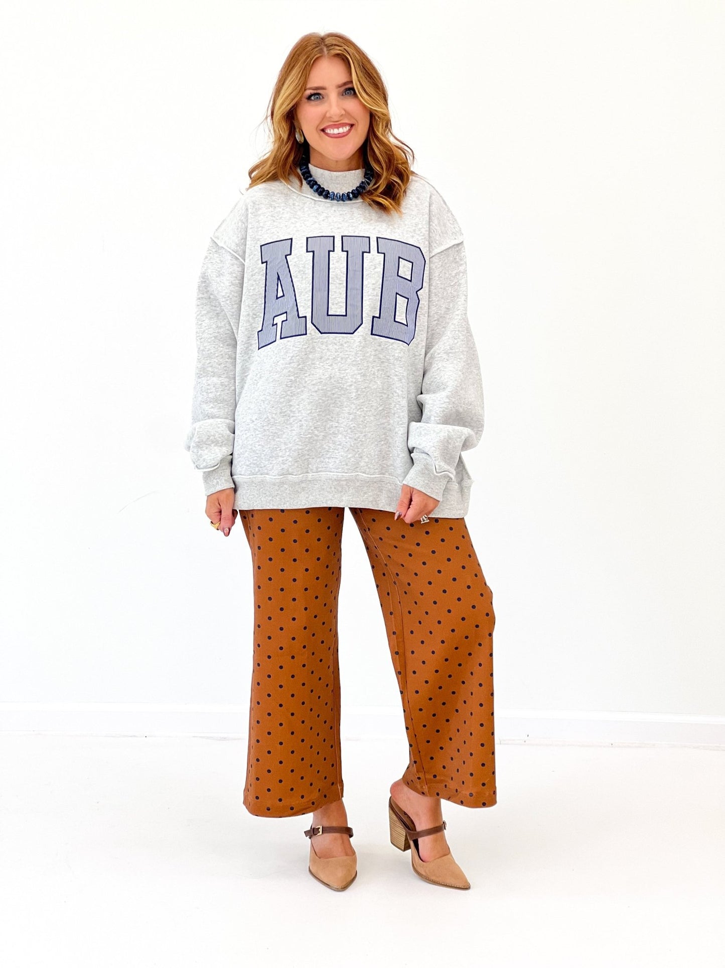 Mock neck pullover sweatshirt with a printed team design