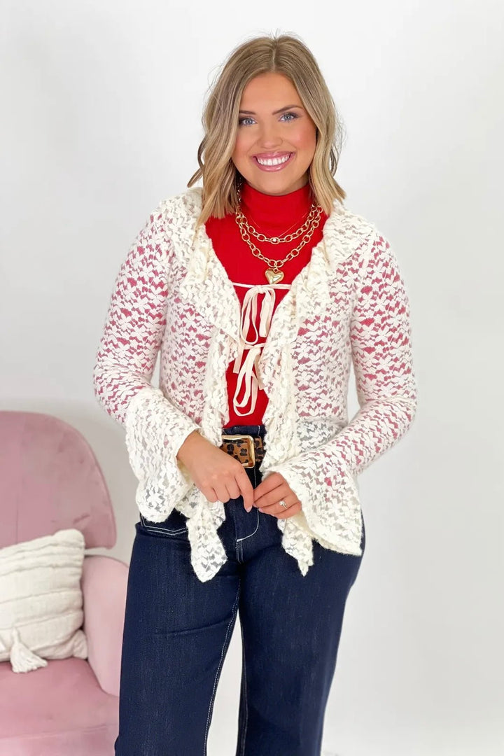 Cream lace cardigan with a tie front