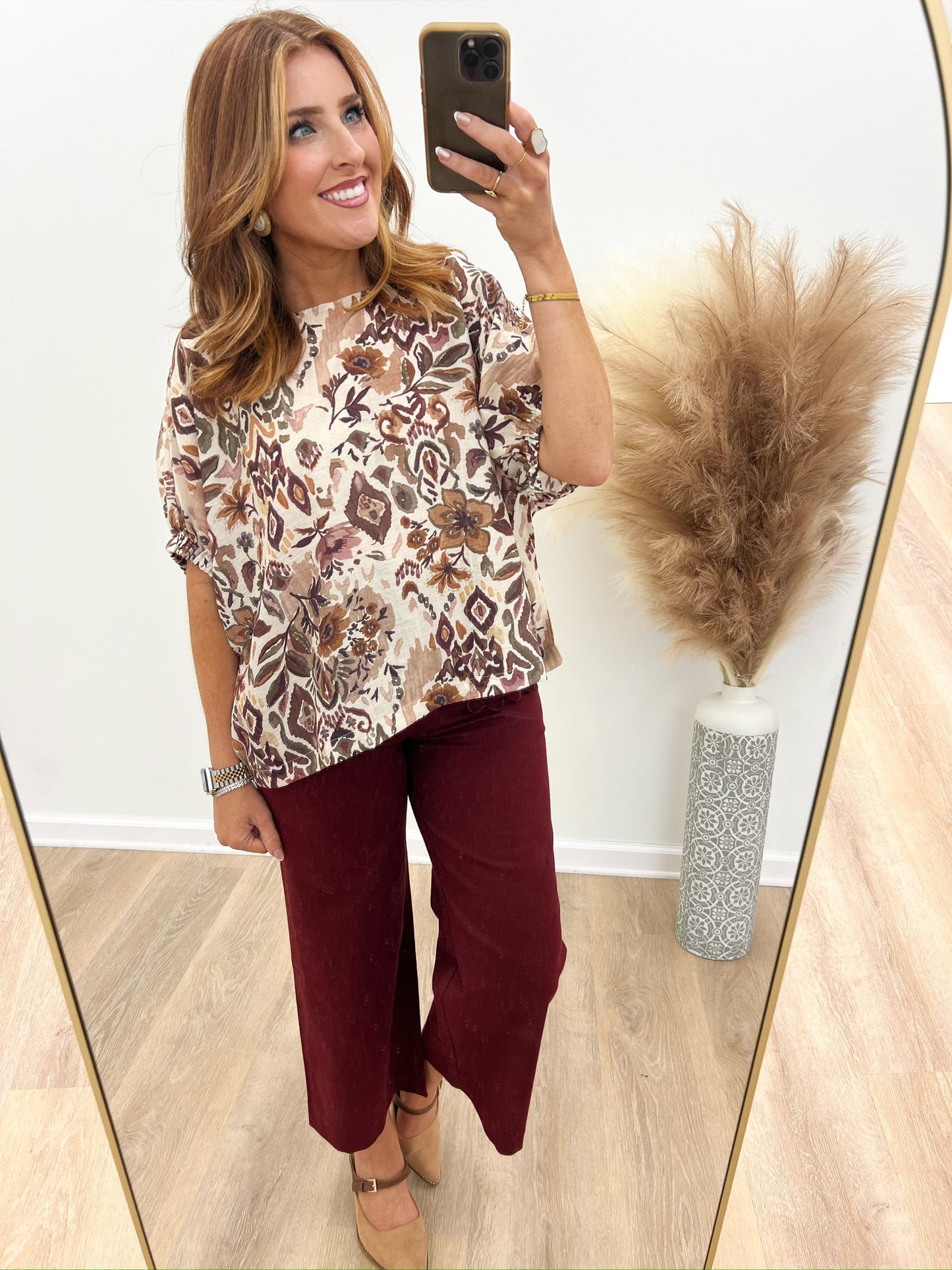 Floral print dolman top with a round neckline