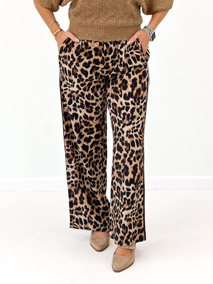 Leopard print pants with a contrast side stripe