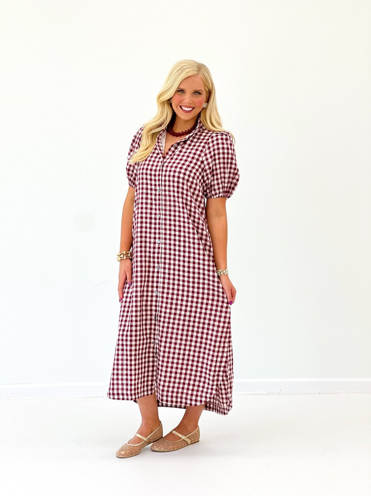 Gingham checked wine dress with a full button closure