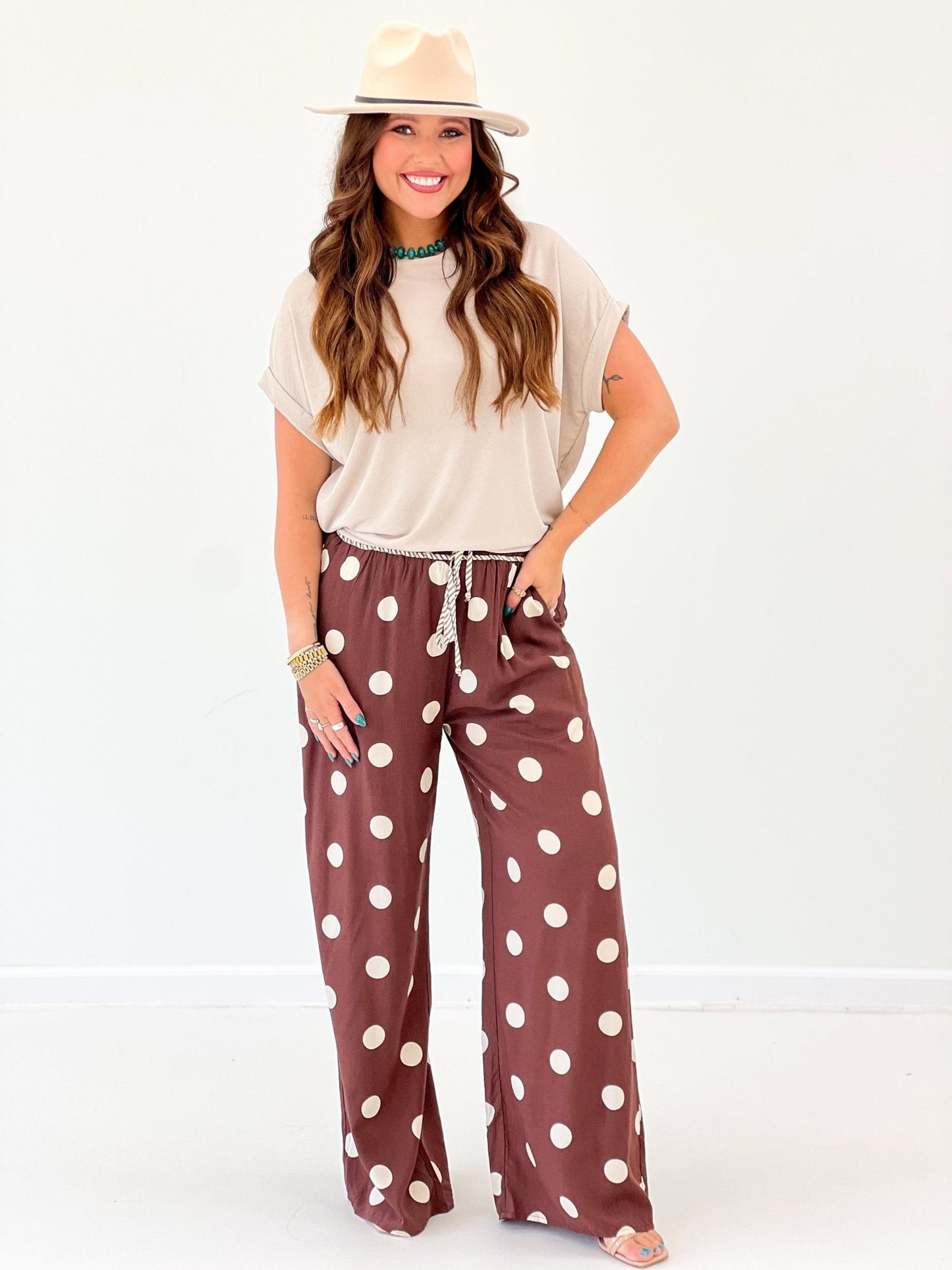 Wide leg brown dot print pants with a straight hem