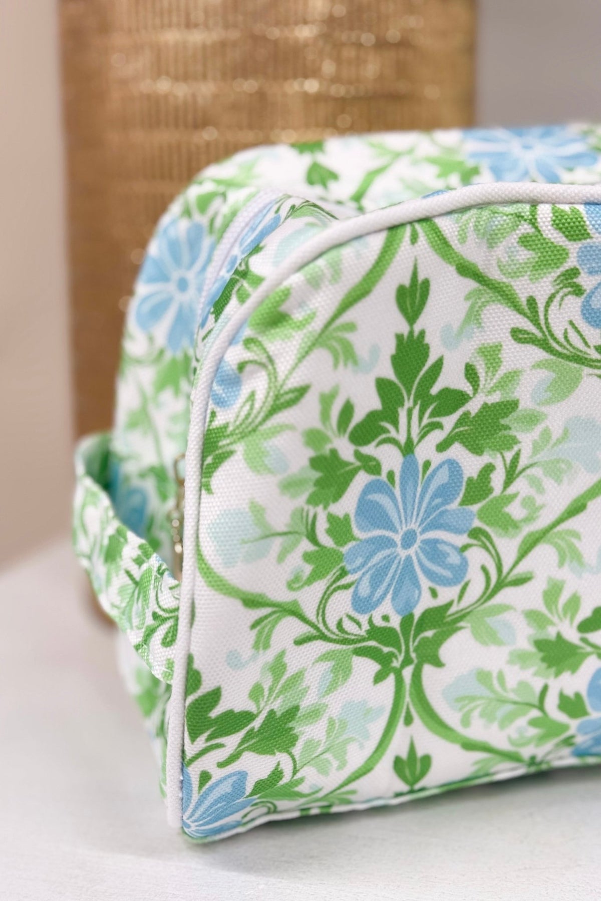 Canvas cosmetic bag with an allover floral design