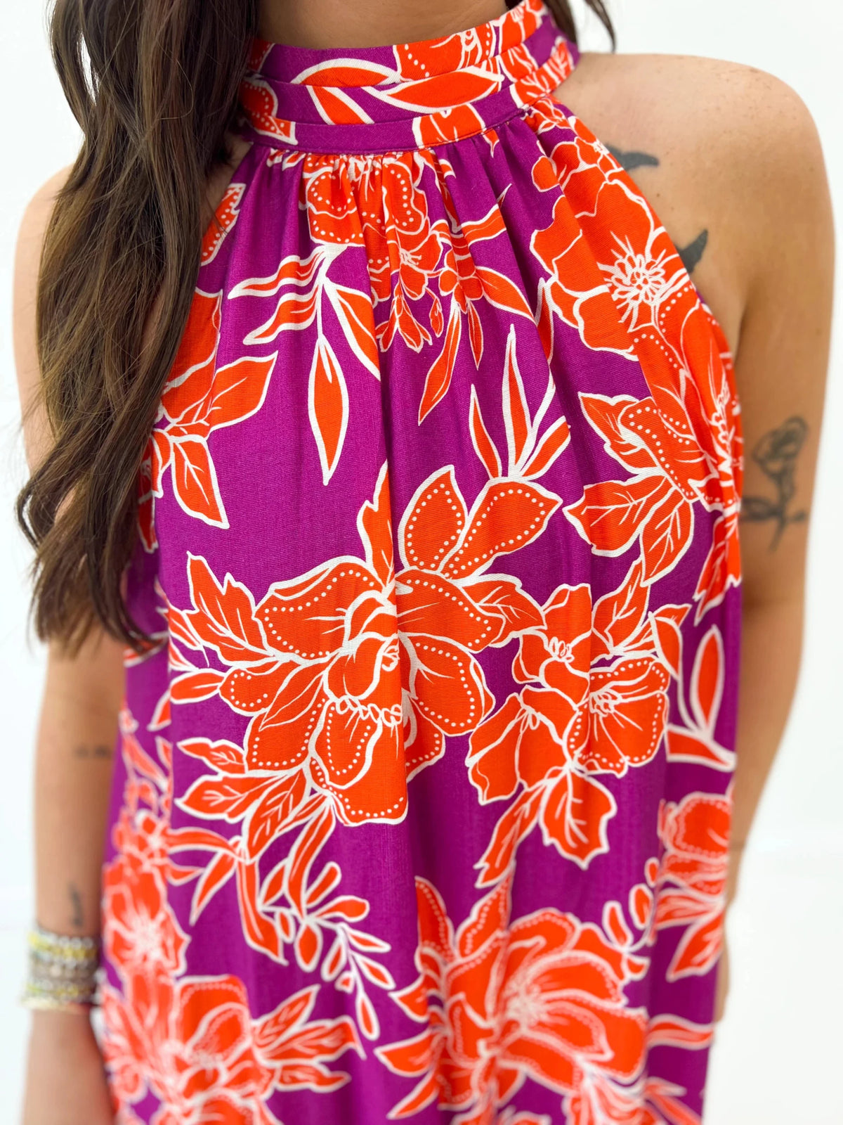 Floral printed midi dress with a halter neck and relaxed fit