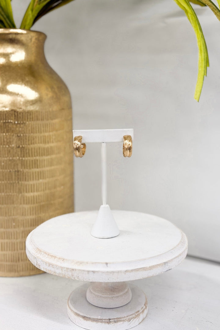 Gold 15mm textured metal hoop earrings