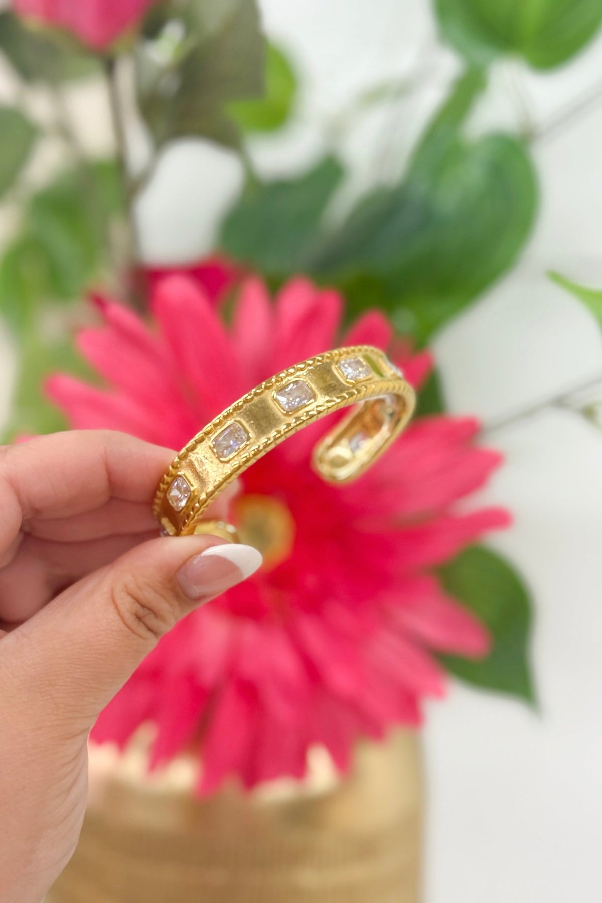 Gold bangle bracelet set with clear stones