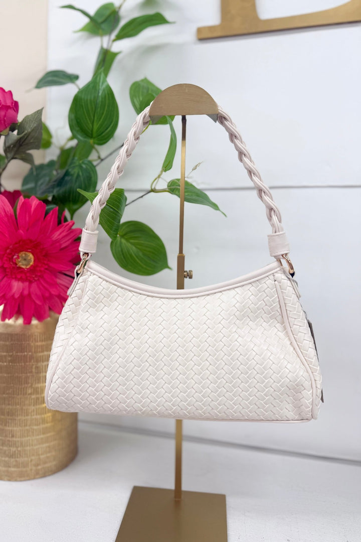 Ivory woven bag with braided handles