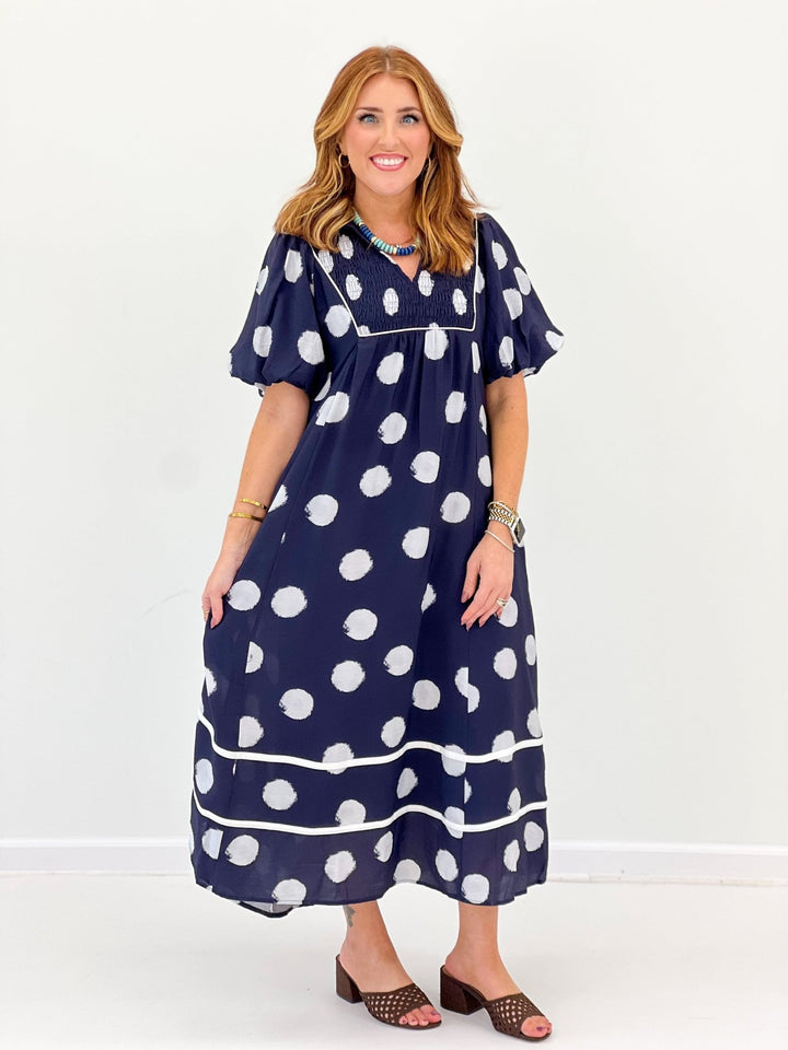 Midi dress with smocked detailing at the bodice