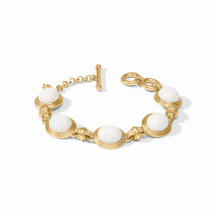 Gold bracelet set with a white jade stone