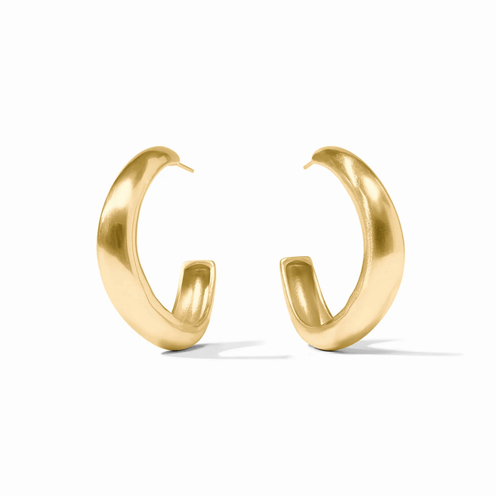 Gold hoop earrings with a wave-shaped band