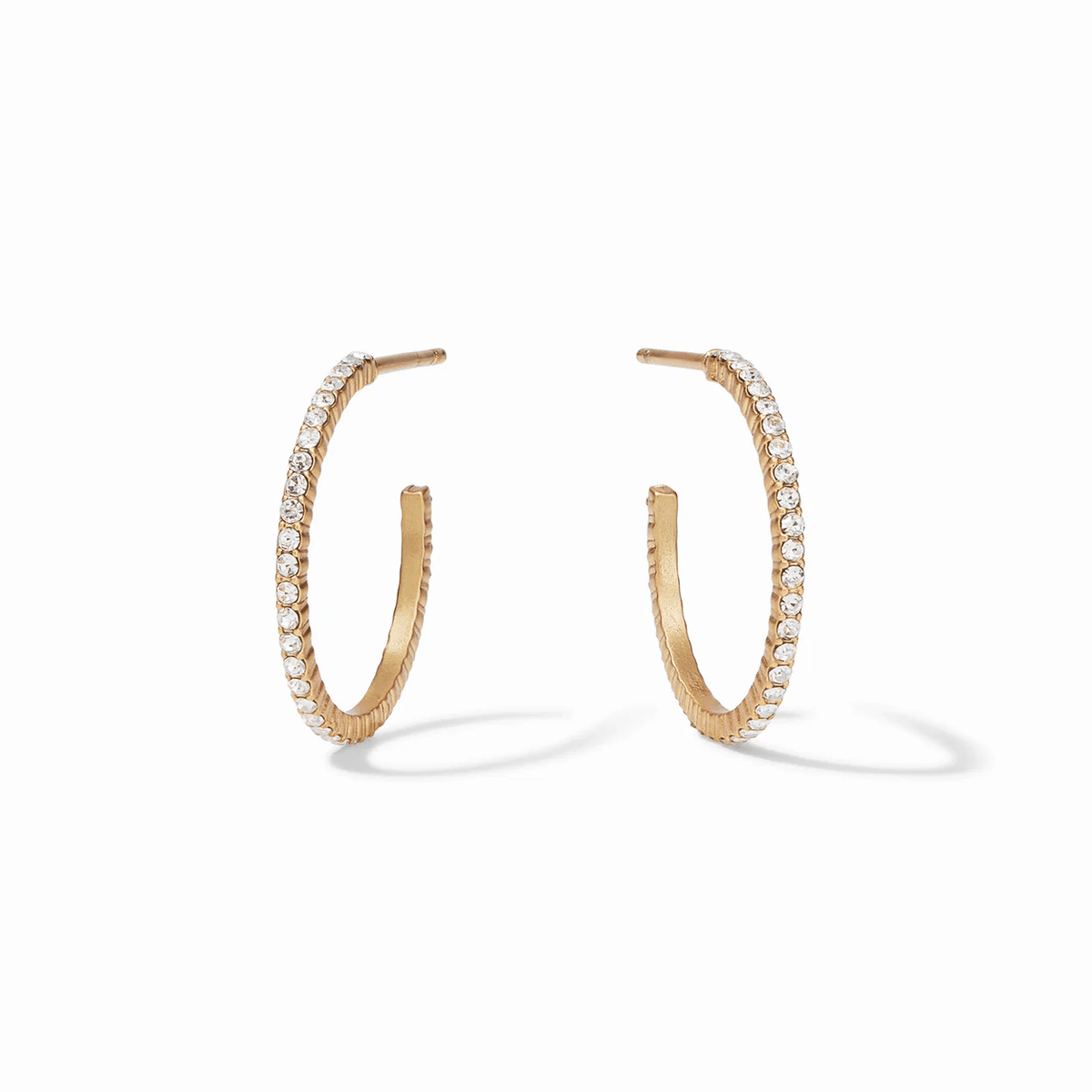Small gold hoop earrings set with cubic zirconia