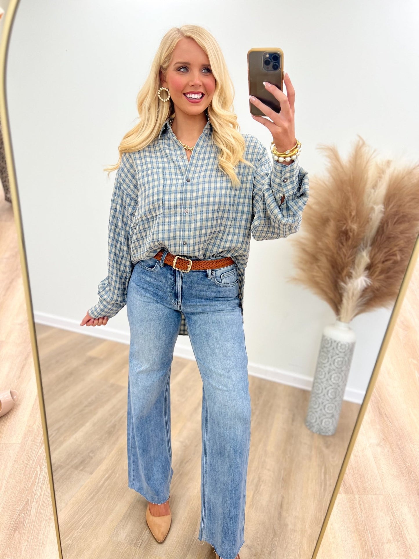 Medium wash wide leg jeans with classic back pockets