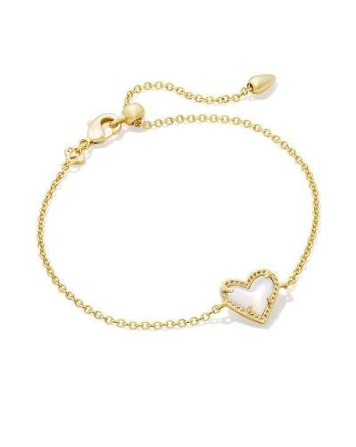 Gold bracelet with an ivory mother of pearl heart