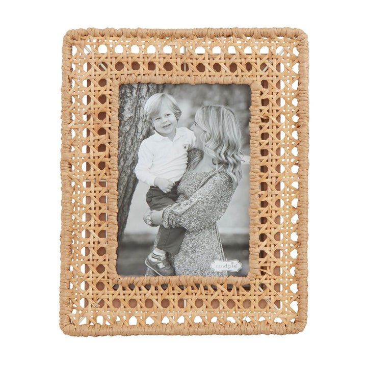 Large picture frame wrapped in natural woven cane