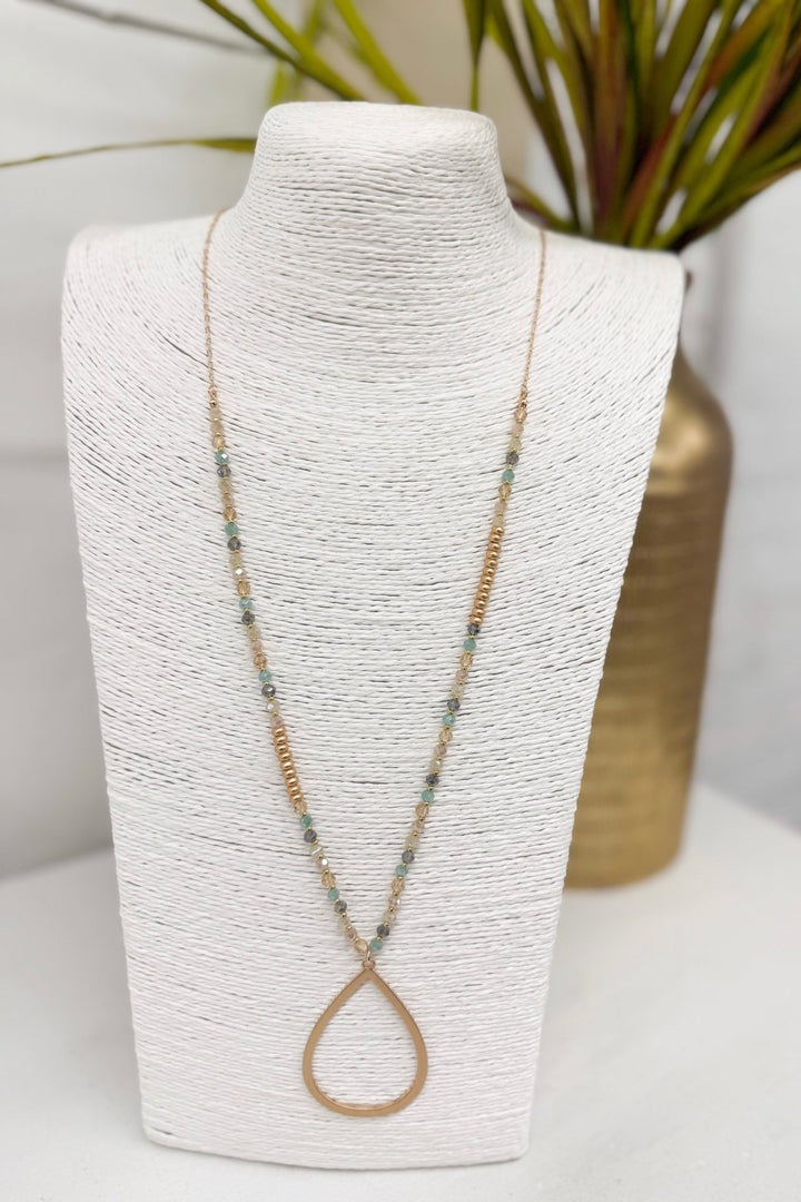 Light multicolor beaded necklace with a teardrop pendant