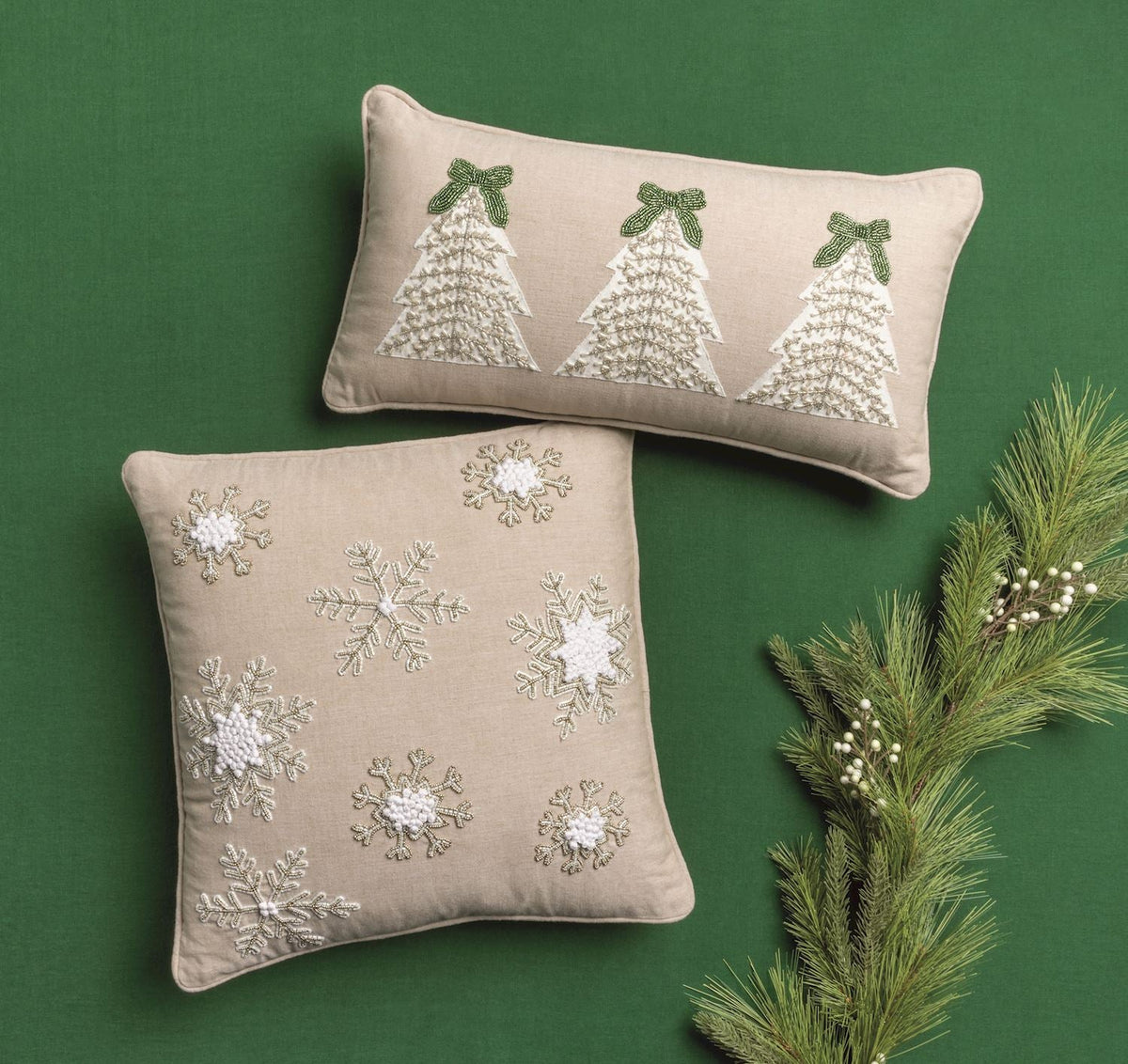 Beaded Christmas tree motif on a natural lumbar throw pillow