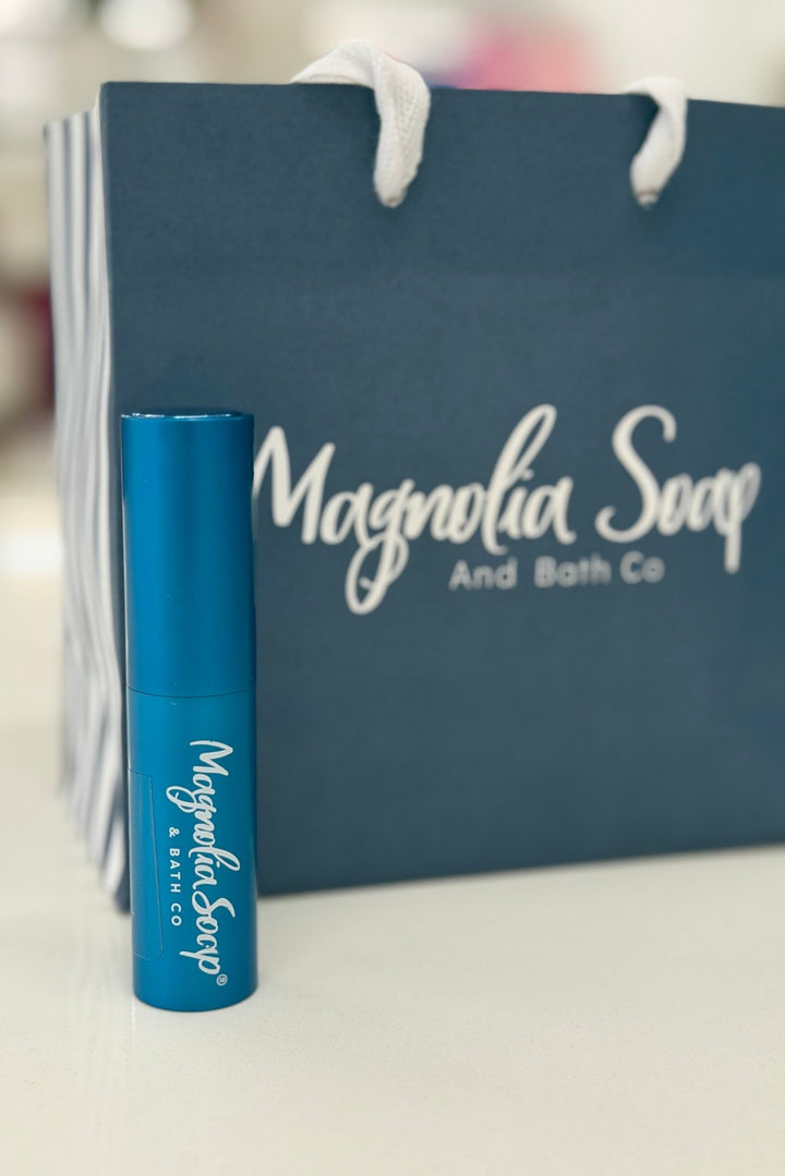Lavish scented purse spray in a travel-size bottle