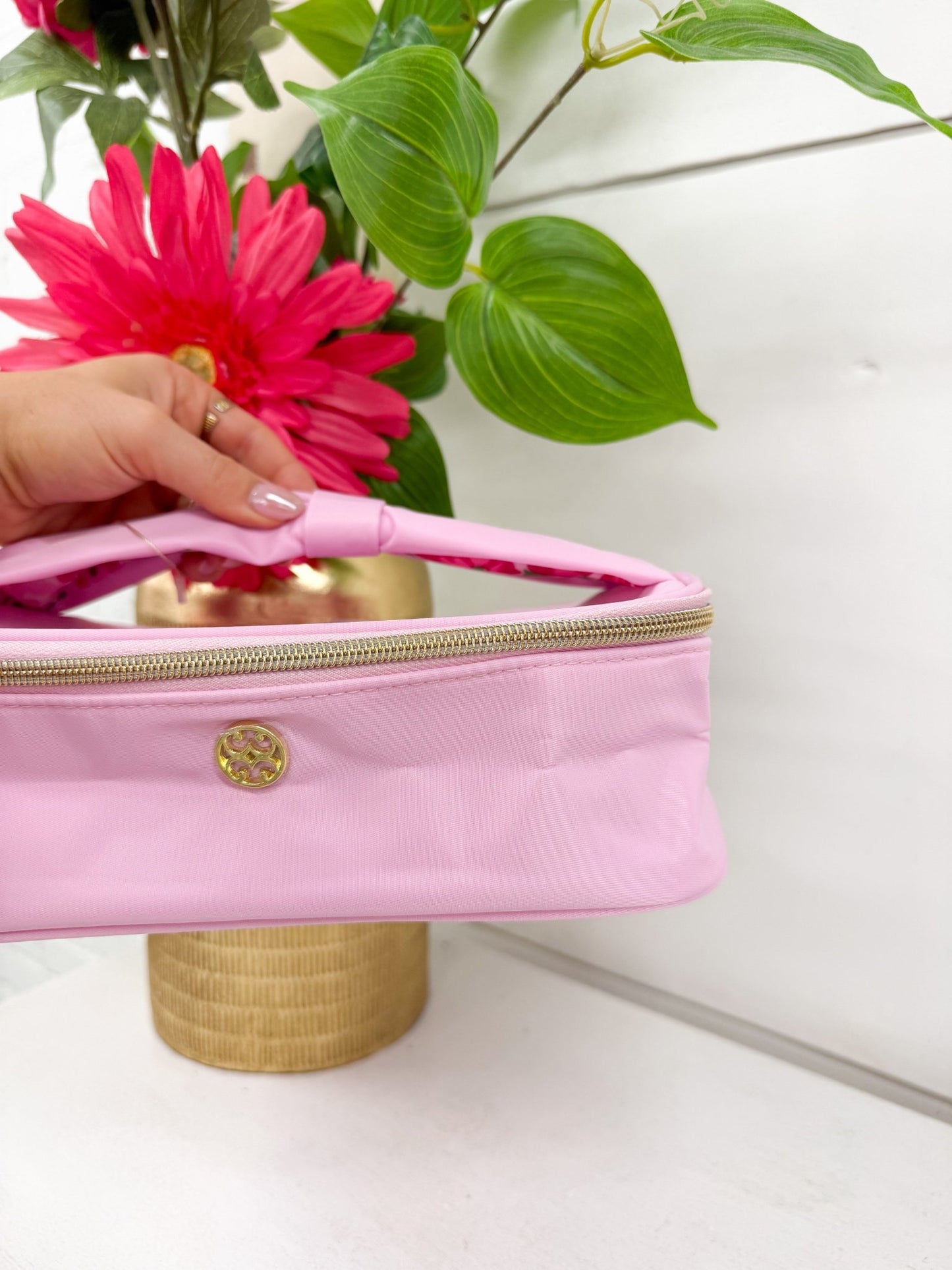 Blush pink cosmetic pouch for makeup storage