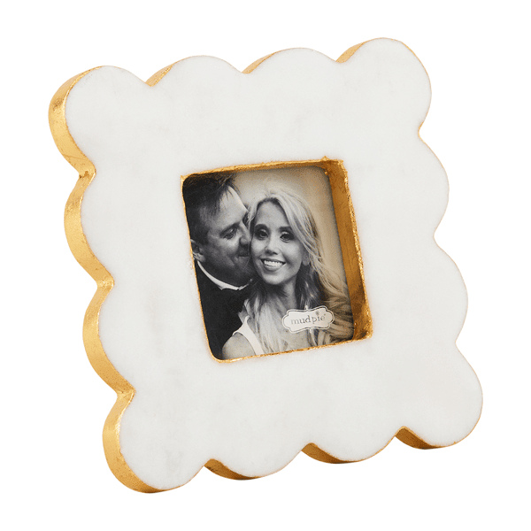 Square marble picture frame with a scalloped edge