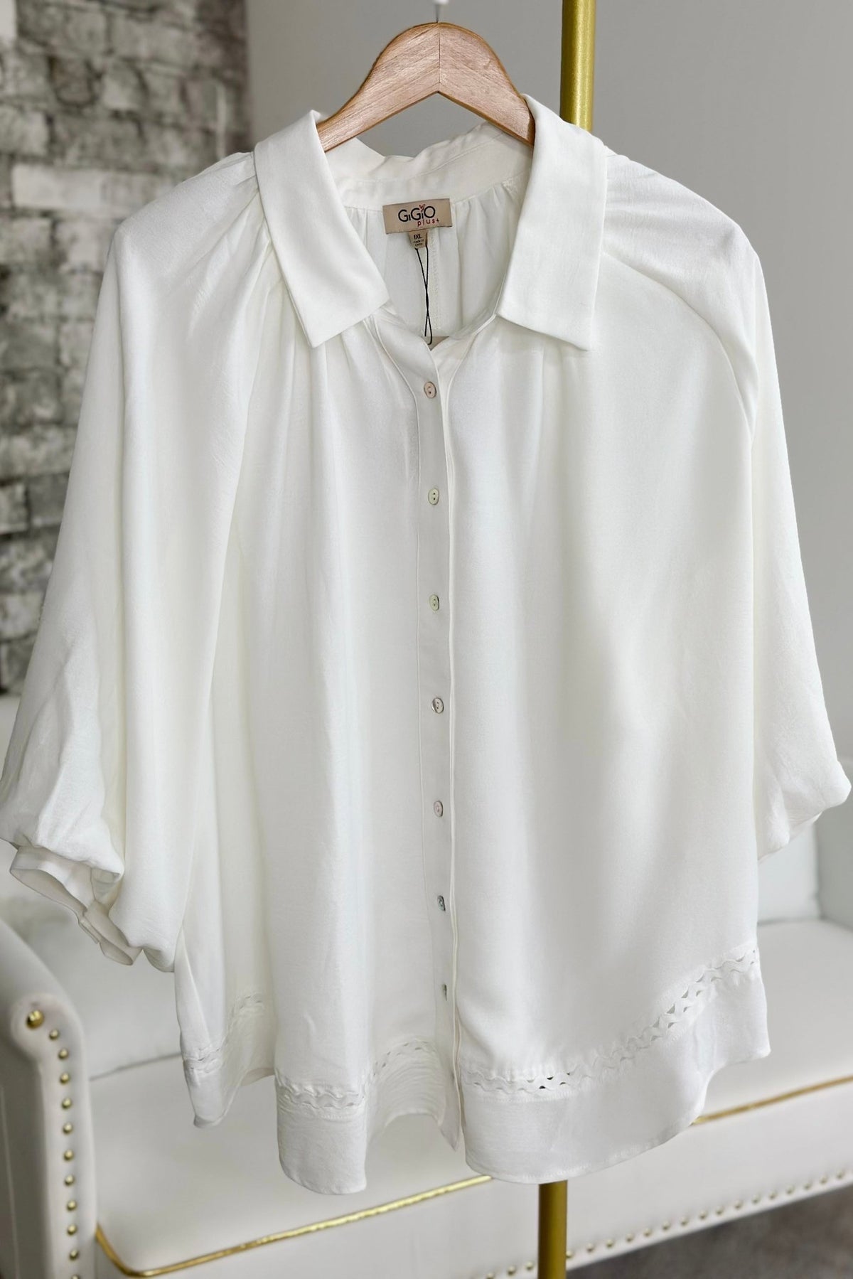 Off white blouse with full billowing sleeves
