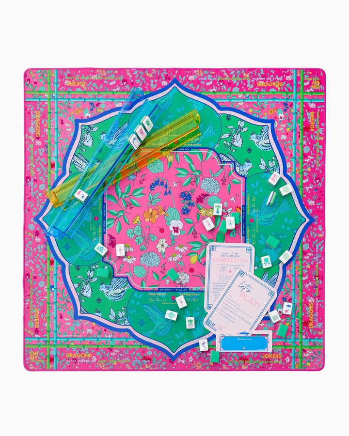 Enchanted print mahjong mat with its storage tube
