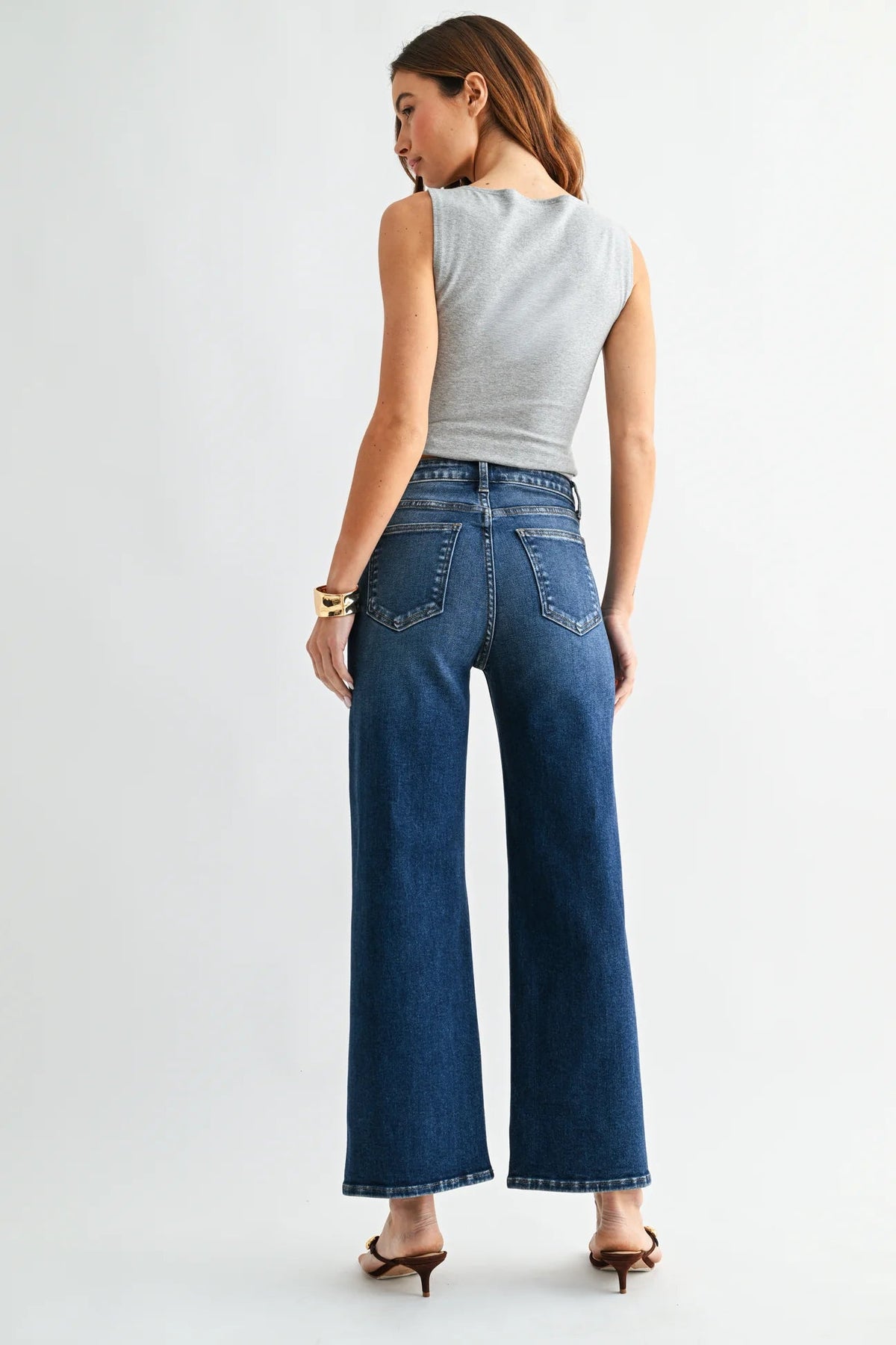 Dark denim high rise jeans with a long straight hem