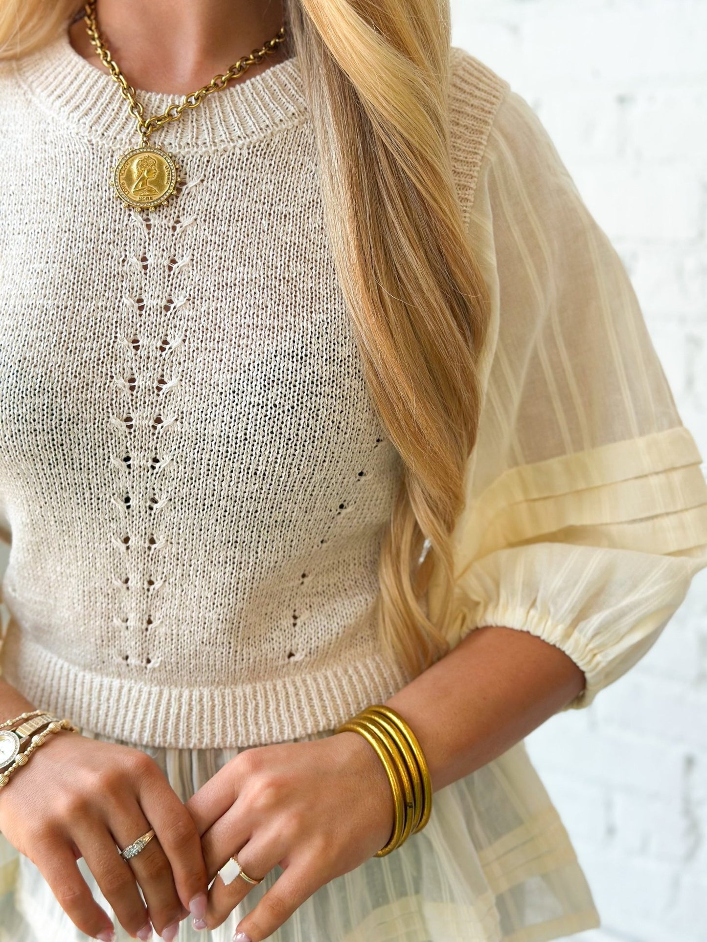 Oatmeal knit top with voluminous sleeves