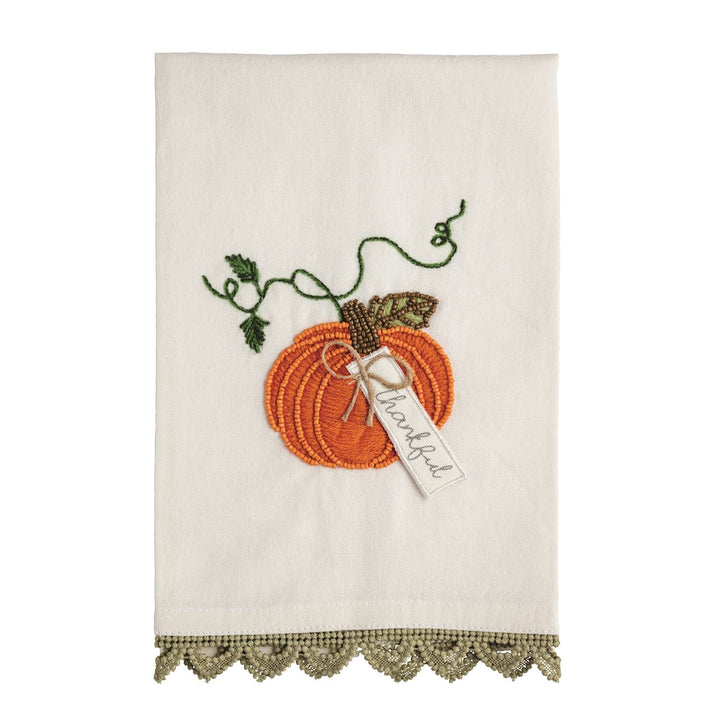 Cream kitchen towel with a beaded pumpkin embroidery