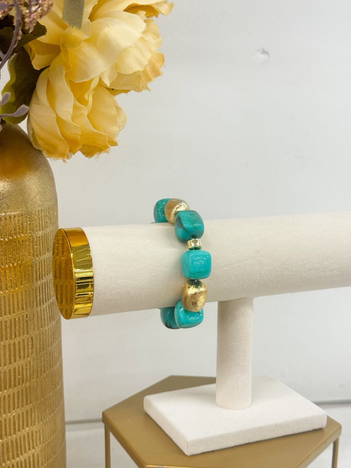 Turquoise beaded bracelet with metallic rounds
