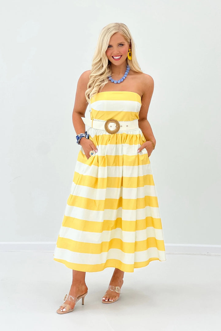 Strapless dress with a belted waist and contrast fabric detail