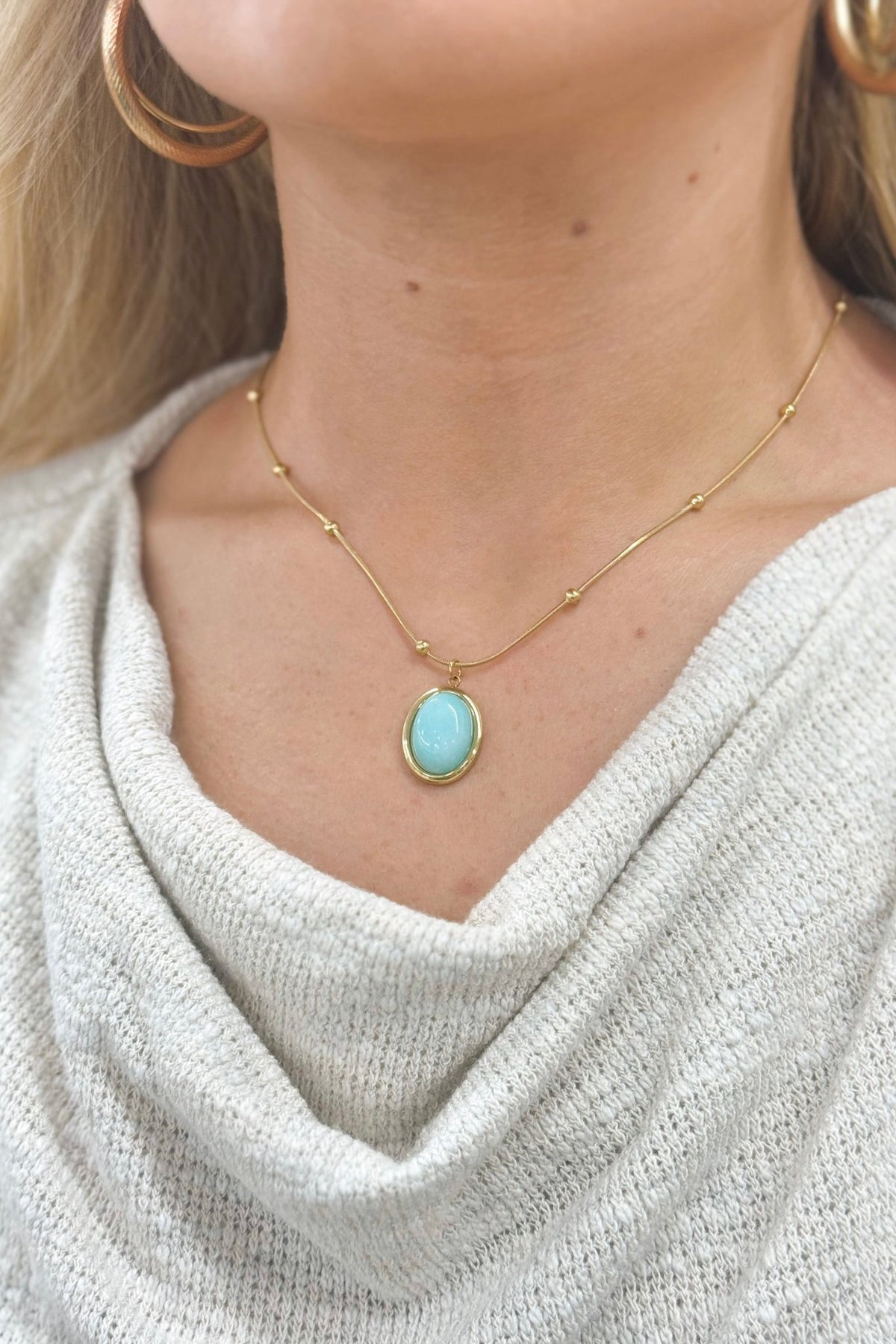 Turquoise stone necklace on a fine chain
