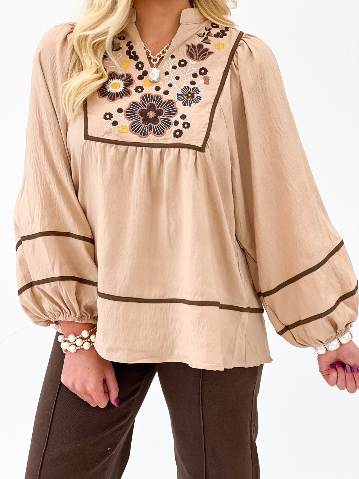 Embroidered oat top with a relaxed drape