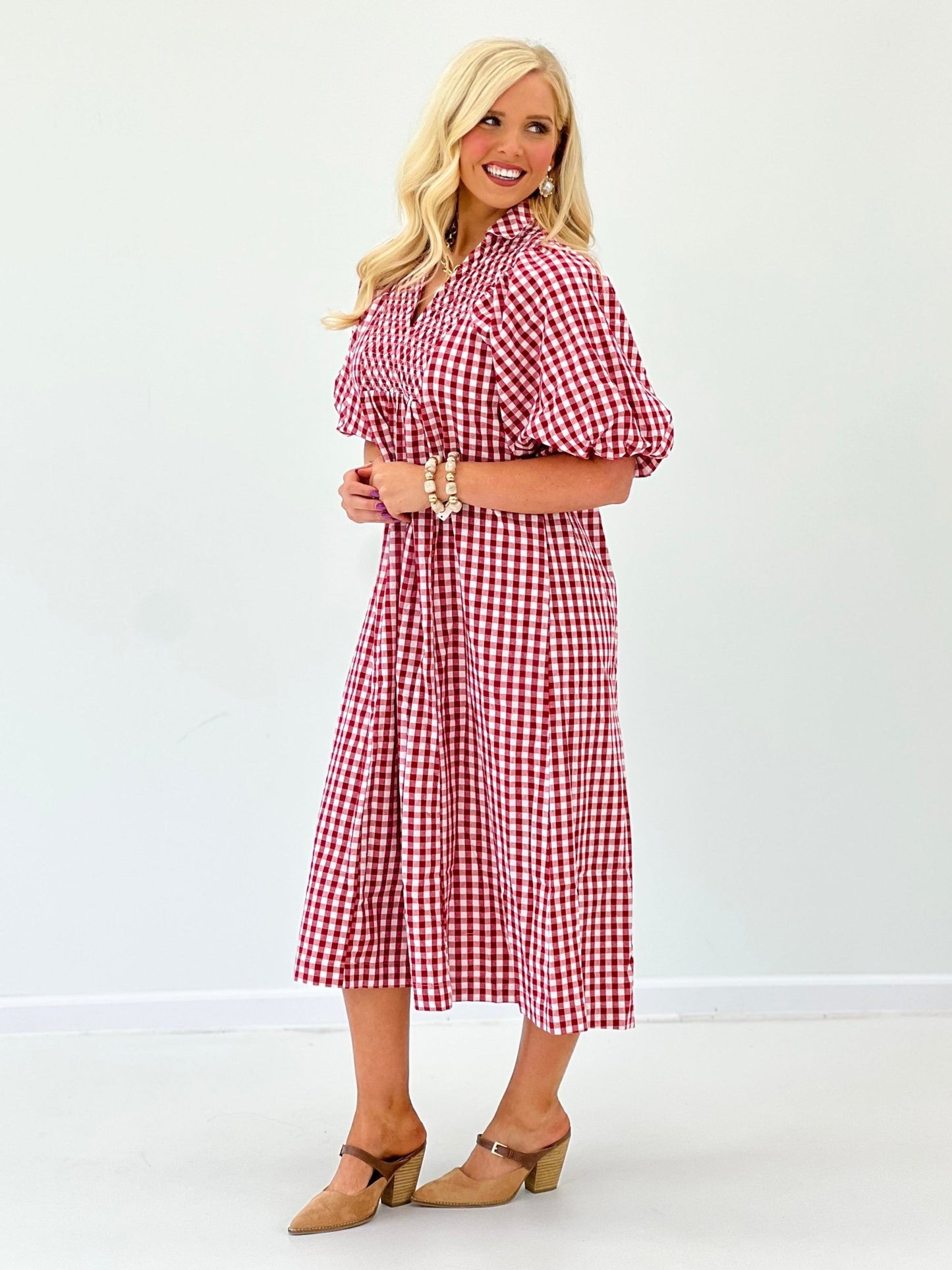 Smocking detail on a plaid midi dress