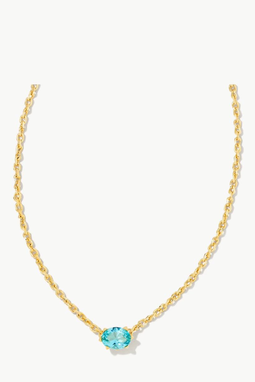 Gold chain pendant necklace with round aqua crystal centerpiece and side links