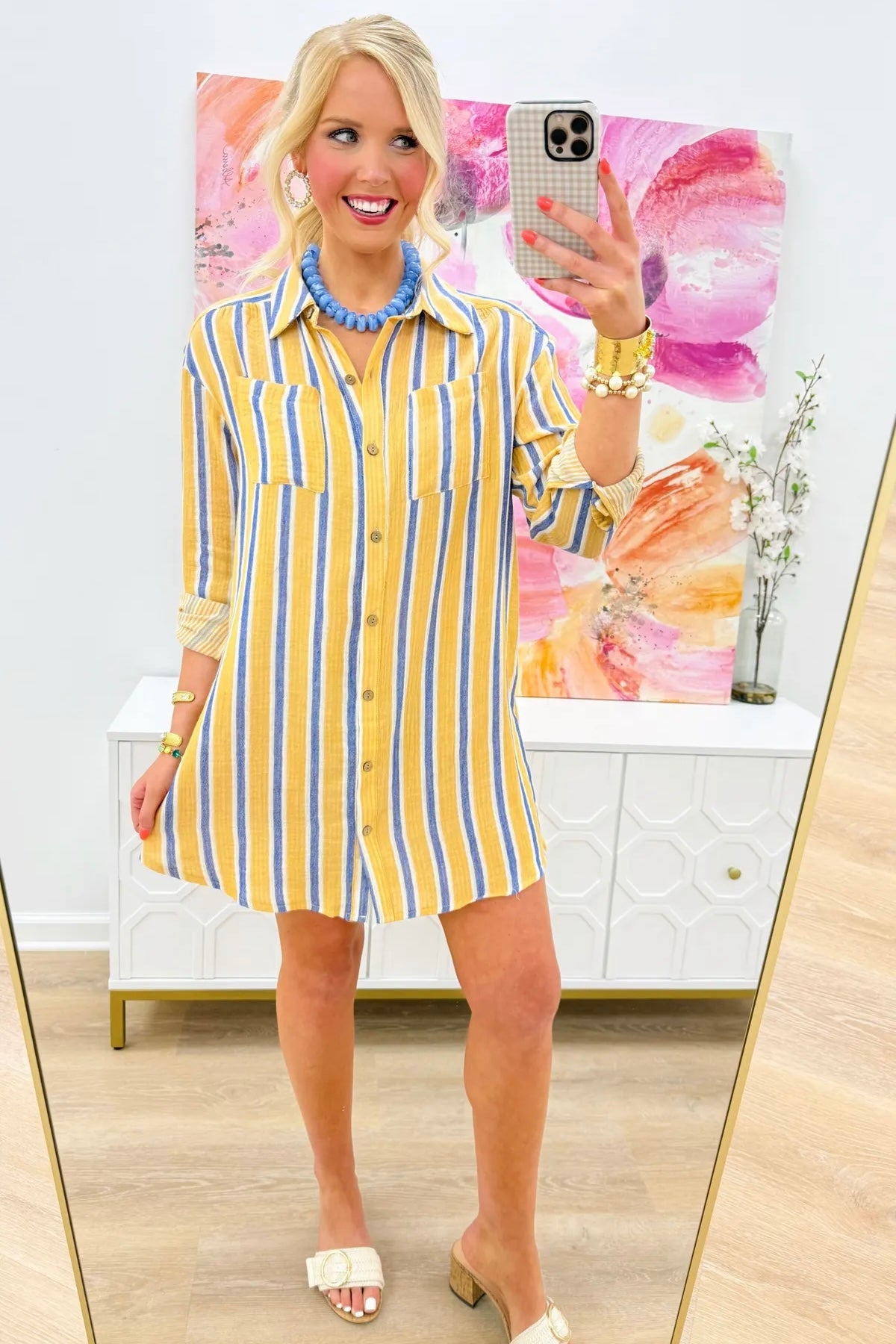 High low hem on a yellow and blue stripe gauze dress