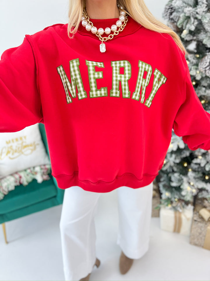 Red mock-neck Christmas sweatshirt with embroidered MERRY in green and white