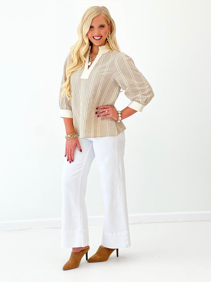 Taupe striped ruffle-collar blouse with gathered cuffs and three-quarter sleeves