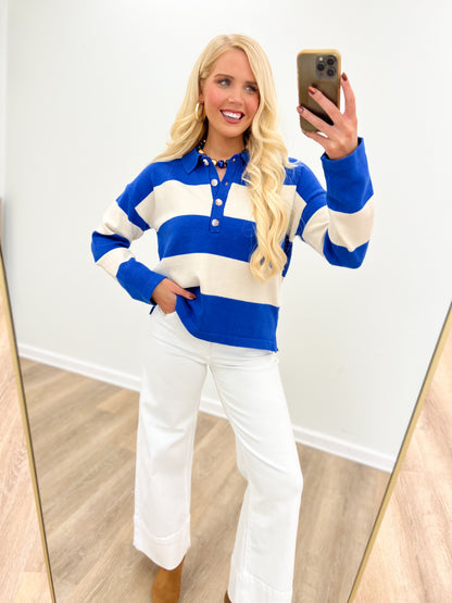 Blue and cream striped collared button-up sweater, long sleeves, button front