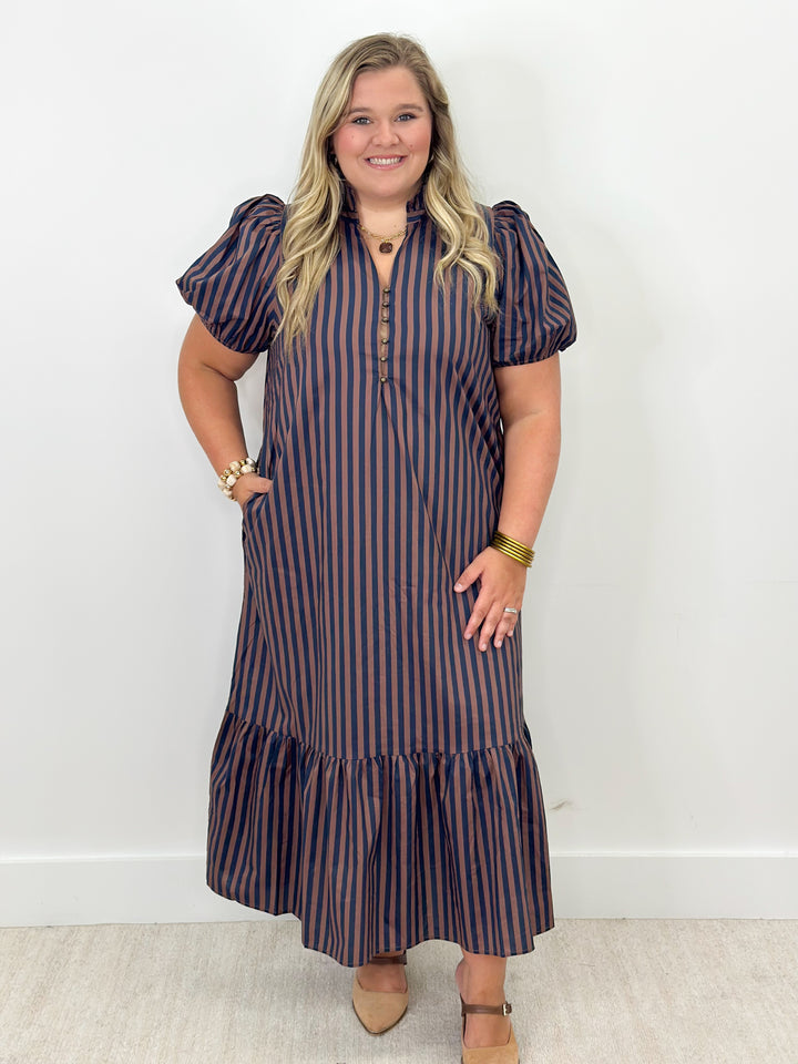 Navy striped midi dress with brown vertical stripes, ruffle collar, and puff sleeves