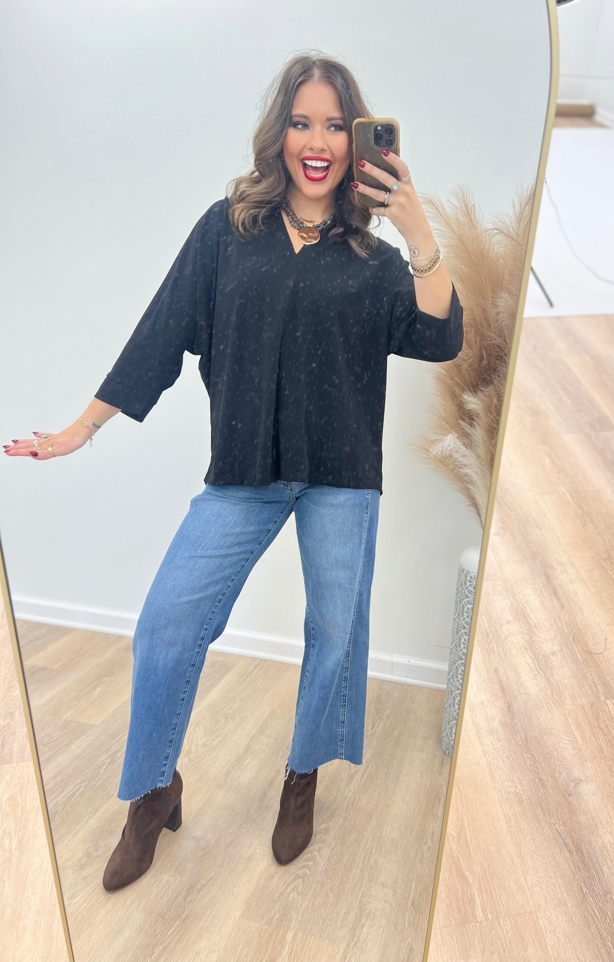V-neck quarter-sleeve top in dark charcoal black with relaxed fit
